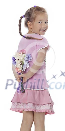 Little girl hiding a bouquet of flowers behind her back Little girl hiding a bouquet of flowers behind her back