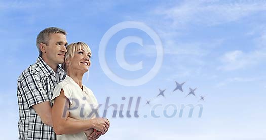 Middle-aged couple hugging Middle-aged couple hugging
