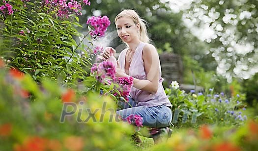 Woman in a green garden Woman in a green garden
