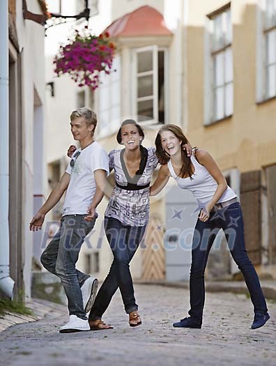 Three friends laughing and having fun