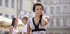 Young woman enjoying the summer in the city