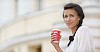 Young woman on a coffee brake