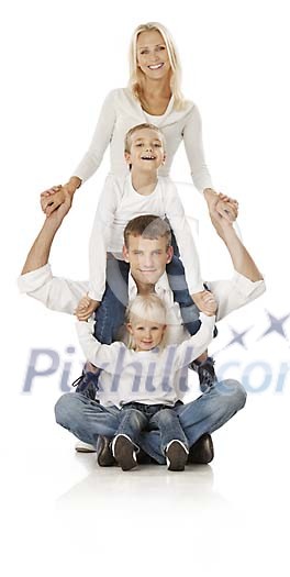 Family of four holding each other Family of four holding each other