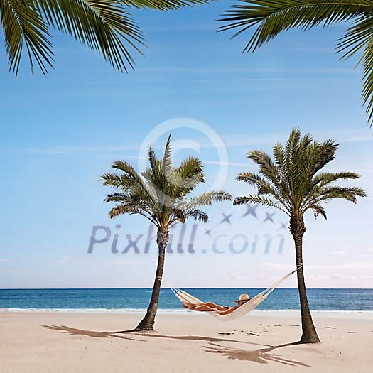 Woman on the beach, relaxing Woman on the beach, relaxing