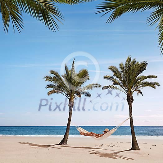 Woman on the beach, relaxing