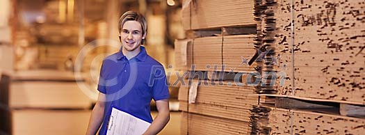 Man in timber industry warehouse Man in timber industry warehouse