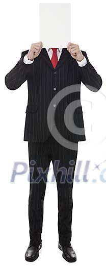 Businessman holding an empty paper in front of his face Businessman holding an empty paper in front of his face