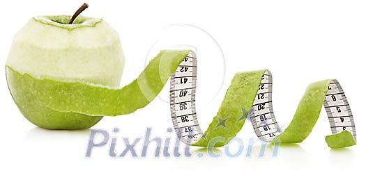 Measuring tape peeled of apple Measuring tape peeled of apple