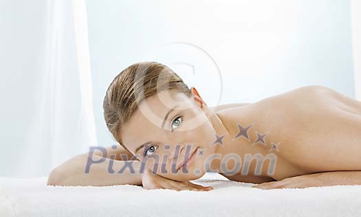 Woman in the spa getting ready for massage Woman in the spa getting ready for massage