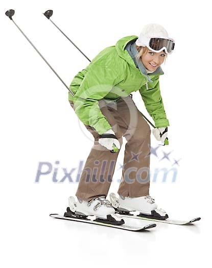 Woman in skiing outfit skiing Woman in skiing outfit skiing