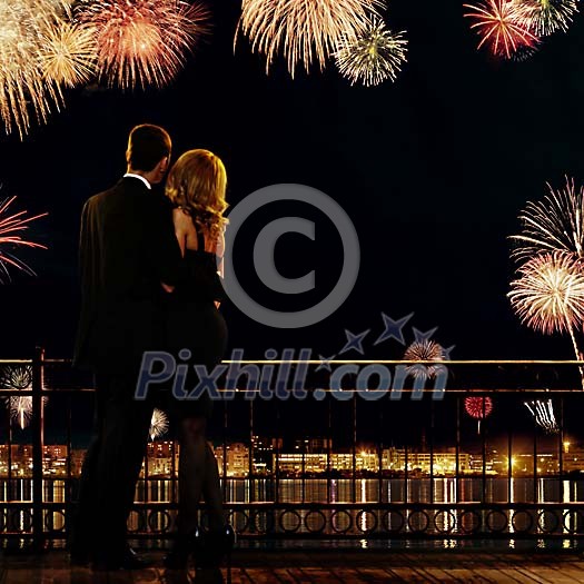 Couple enjoying the fireworks Couple enjoying the fireworks
