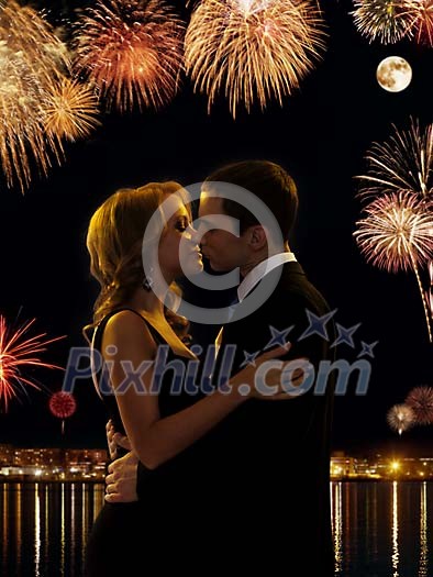 Couple kissing by fireworks Couple kissing by fireworks