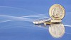 Euro coins on a blue background