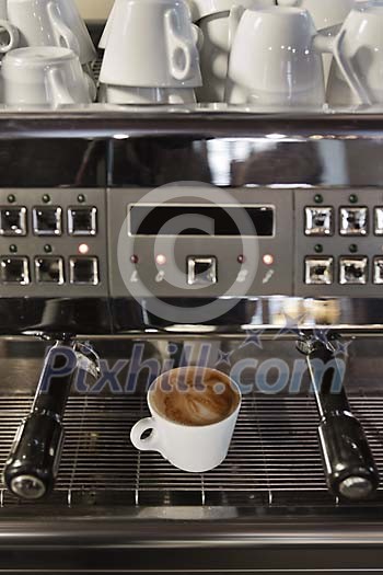 Cappucino freshly out of the machine Cappucino freshly out of the machine