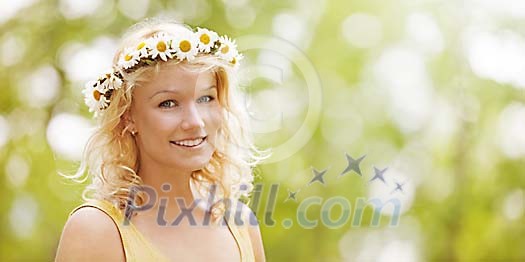 Beautiful girl wearing a summer wreath made of fresh daisies Beautiful girl wearing a summer wreath made of fresh daisies