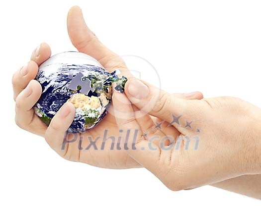 Clipped hands completing earth puzzle ball Clipped hands completing earth puzzle ball