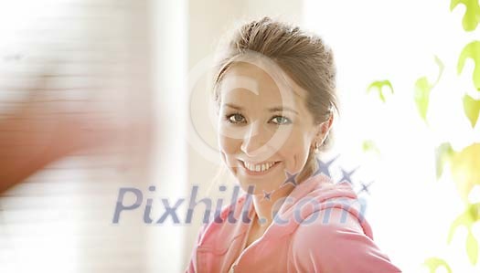 Pretty woman smiling at the camera Pretty woman smiling at the camera