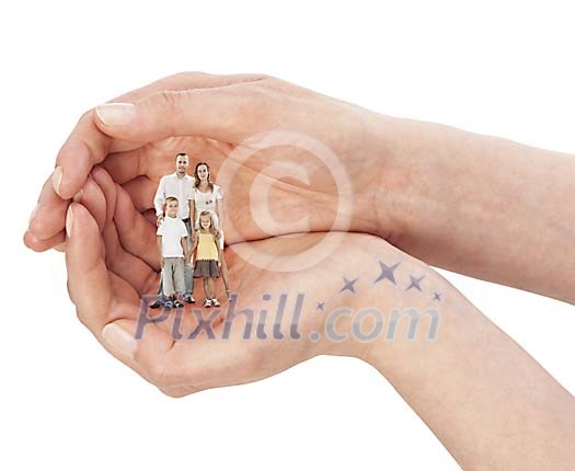 Clipped hands holding an actual family Clipped hands holding an actual family