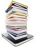 Pile of books on top of a digital tablet