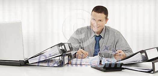 Male bookkeeper at work Male bookkeeper at work