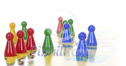 Boardgame pieces on a board Boardgame pieces on a board