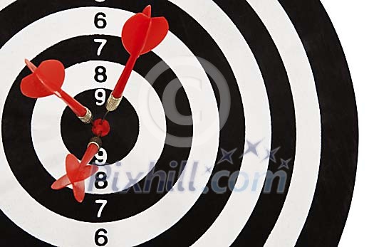 3 darts in center of dartboard 3 darts in center of dartboard