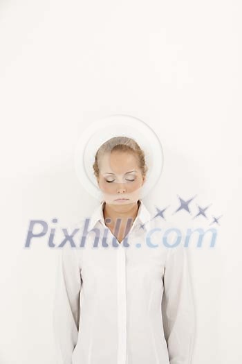 Girl relaxing against white wall Girl relaxing against white wall