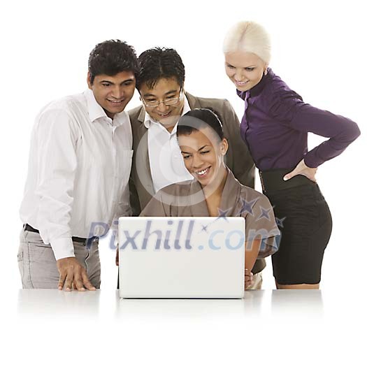Multicultural group behind laptop Multicultural group behind laptop