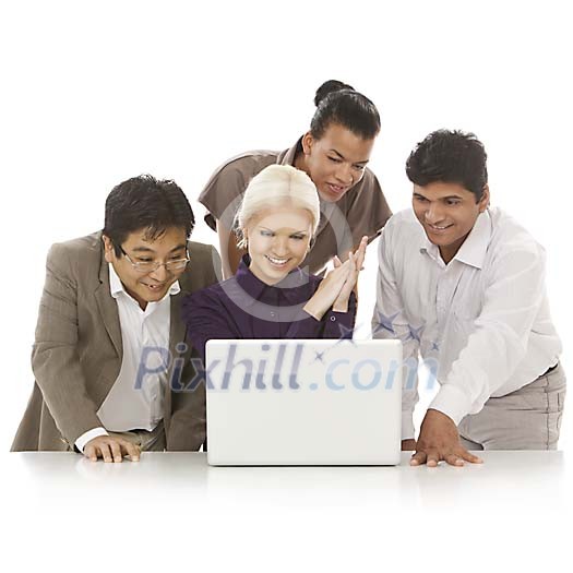Multicultural group behind laptop Multicultural group behind laptop