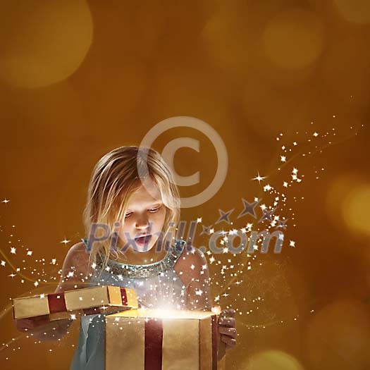 Girl opening christmas gift box Girl opening christmas gift box