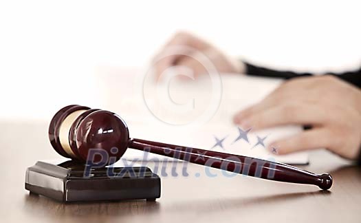 Judge gavel on table Judge gavel on table