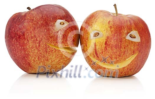 Two apples with eyes and mouths Two apples with eyes and mouths