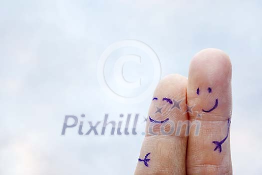 Fingers with faces holding and smiling Fingers with faces holding and smiling