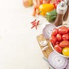 Salad ingredients on light wooden background