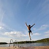 Male diving into the lake