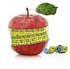 Apple with measuring tape