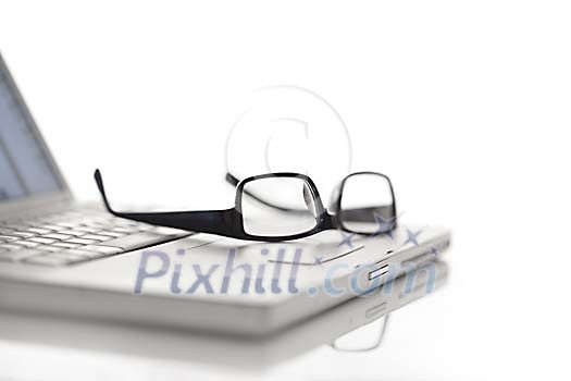 Glasses on laptop Glasses on laptop