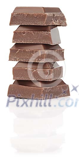 Isolated chocolate pieces piled up Isolated chocolate pieces piled up