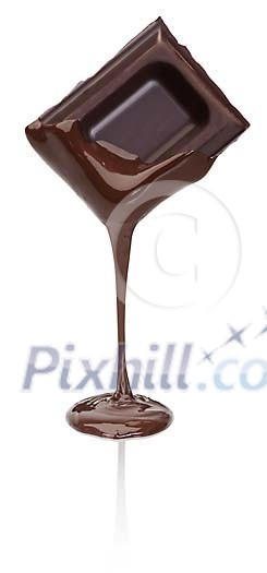 Isolated pure chocolate piece melting Isolated pure chocolate piece melting