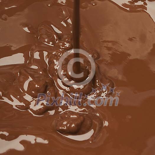 Baclkround of melted chocolate Baclkround of melted chocolate