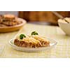 Karelian pasty with egg butter on a plate