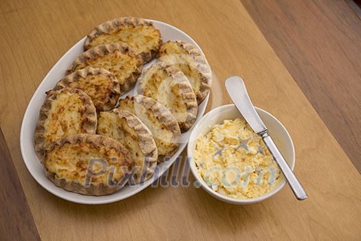 Karelian pasty with a bowl of egg butter Karelian pasty with a bowl of egg butter