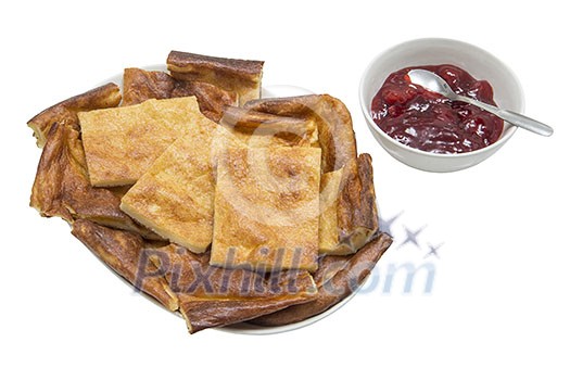 Isolated stack of pancake with a bowl of jam Isolated stack of pancake with a bowl of jam