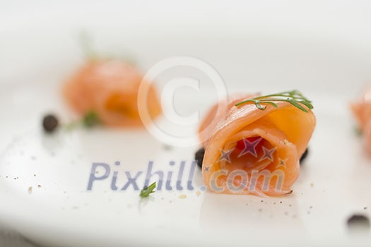 Rolls of gravlax with dill Rolls of gravlax with dill