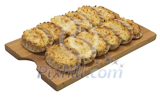 Isolated karelian pasty on a cutting board Isolated karelian pasty on a cutting board