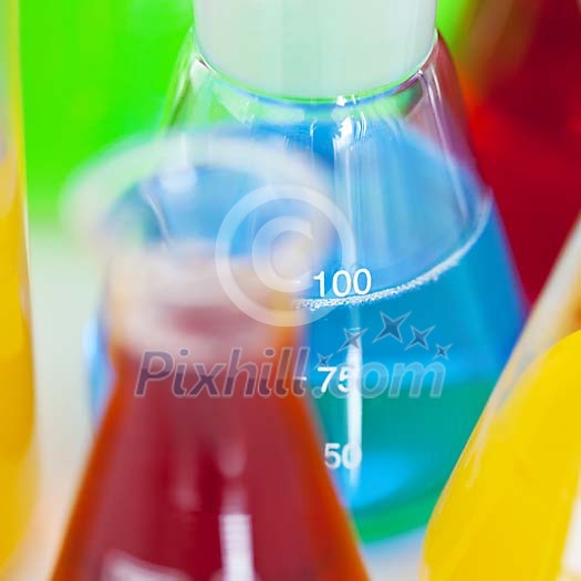 Coloured fluids in measuring glasses Coloured fluids in measuring glasses