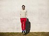 Hipster man jumping up outside