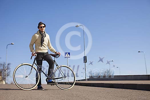 Man with a bike outside Man with a bike outside