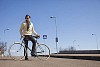 Man with a bike outside