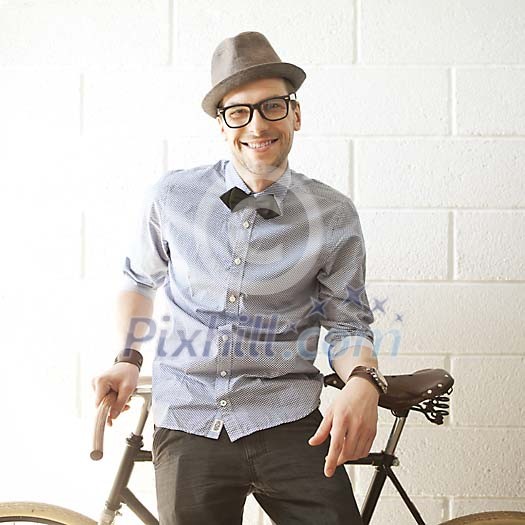 Man smiling while sitting on his bike Man smiling while sitting on his bike